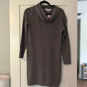 Grey sweater dress with cowl neck.